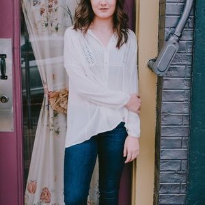 white long sleeved blouse